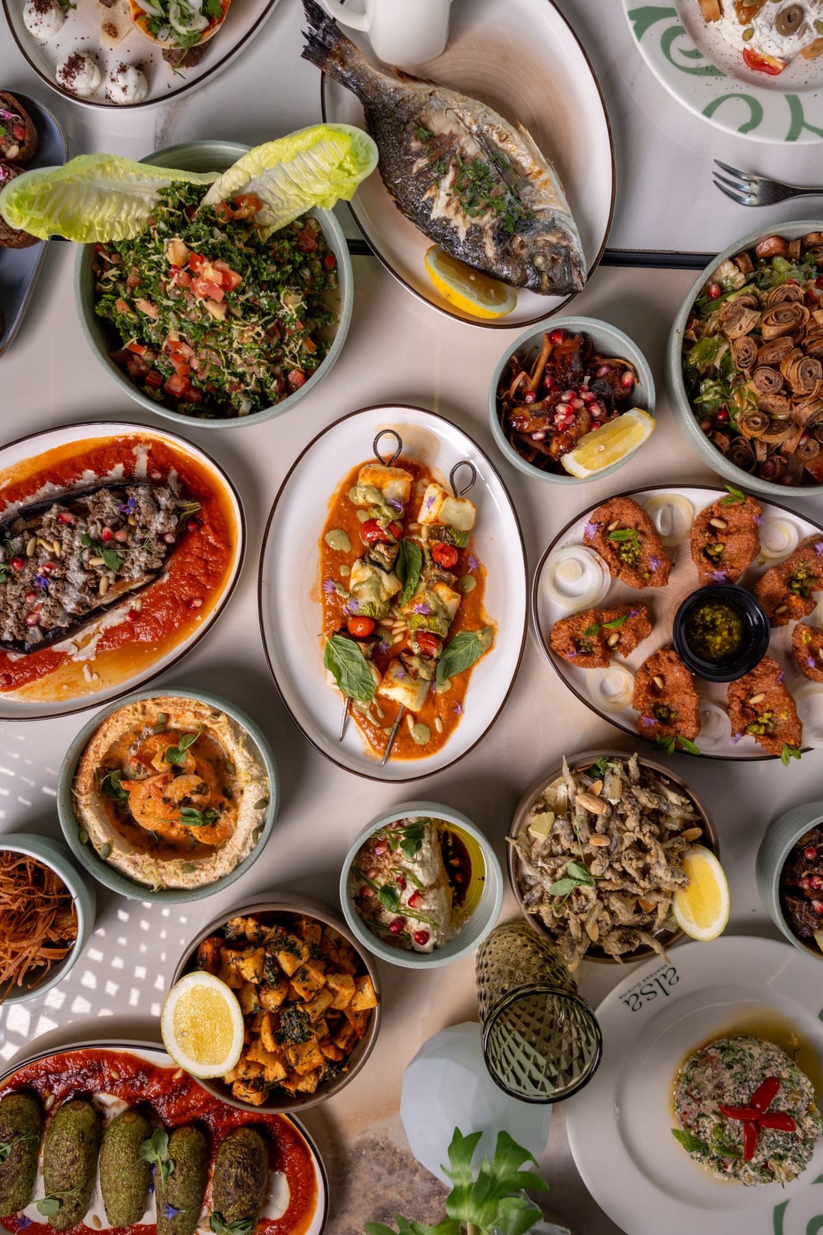Lebanese mezze spread with grilled fish at ALSA