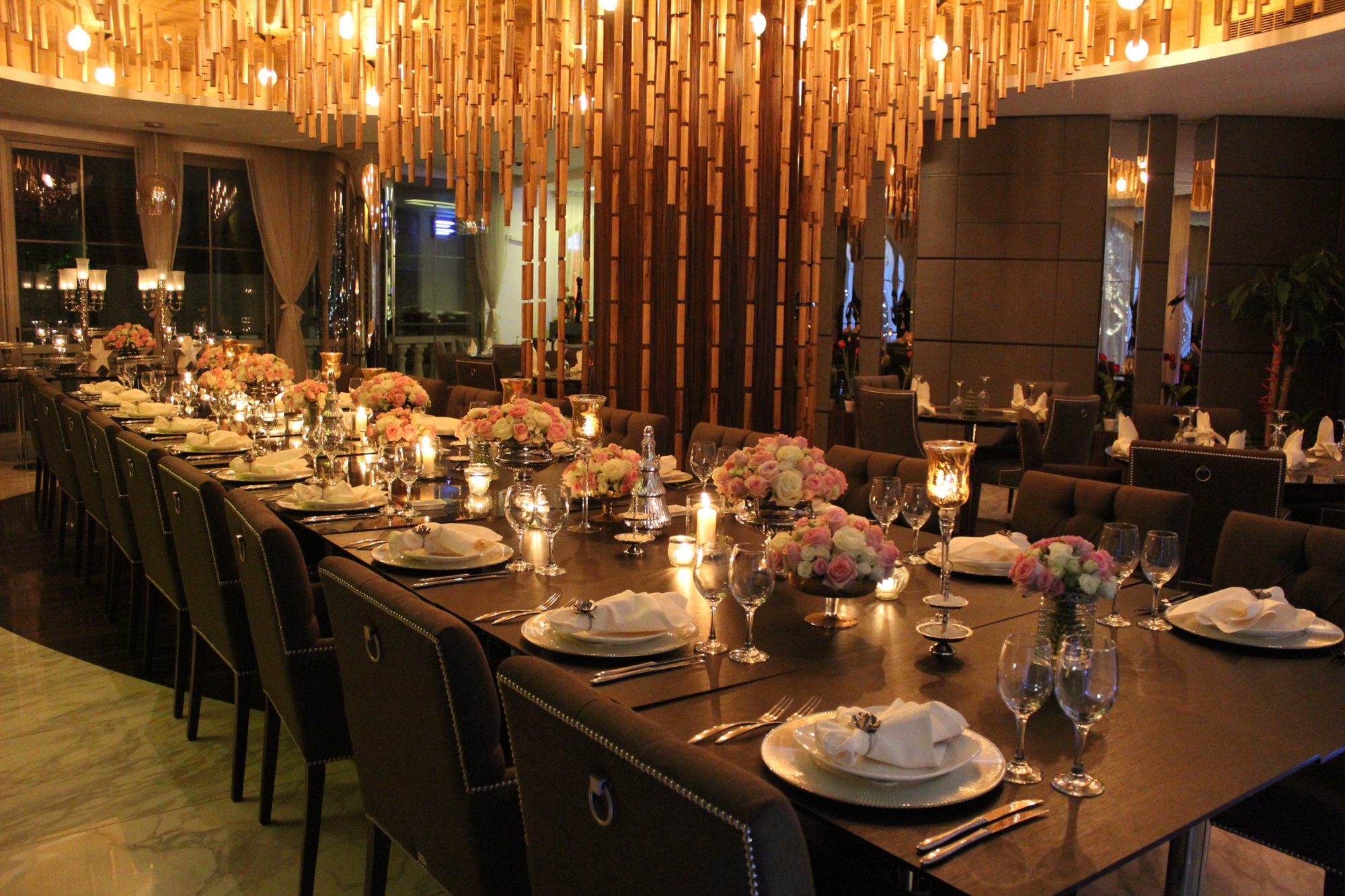 Long candlelit table in Tulip Lounge